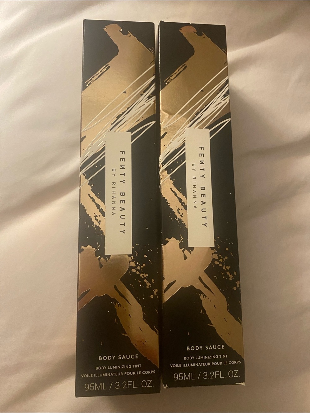Duo Fenty Beauty Body Sauce Body Luminizing Tint — Black, Gold